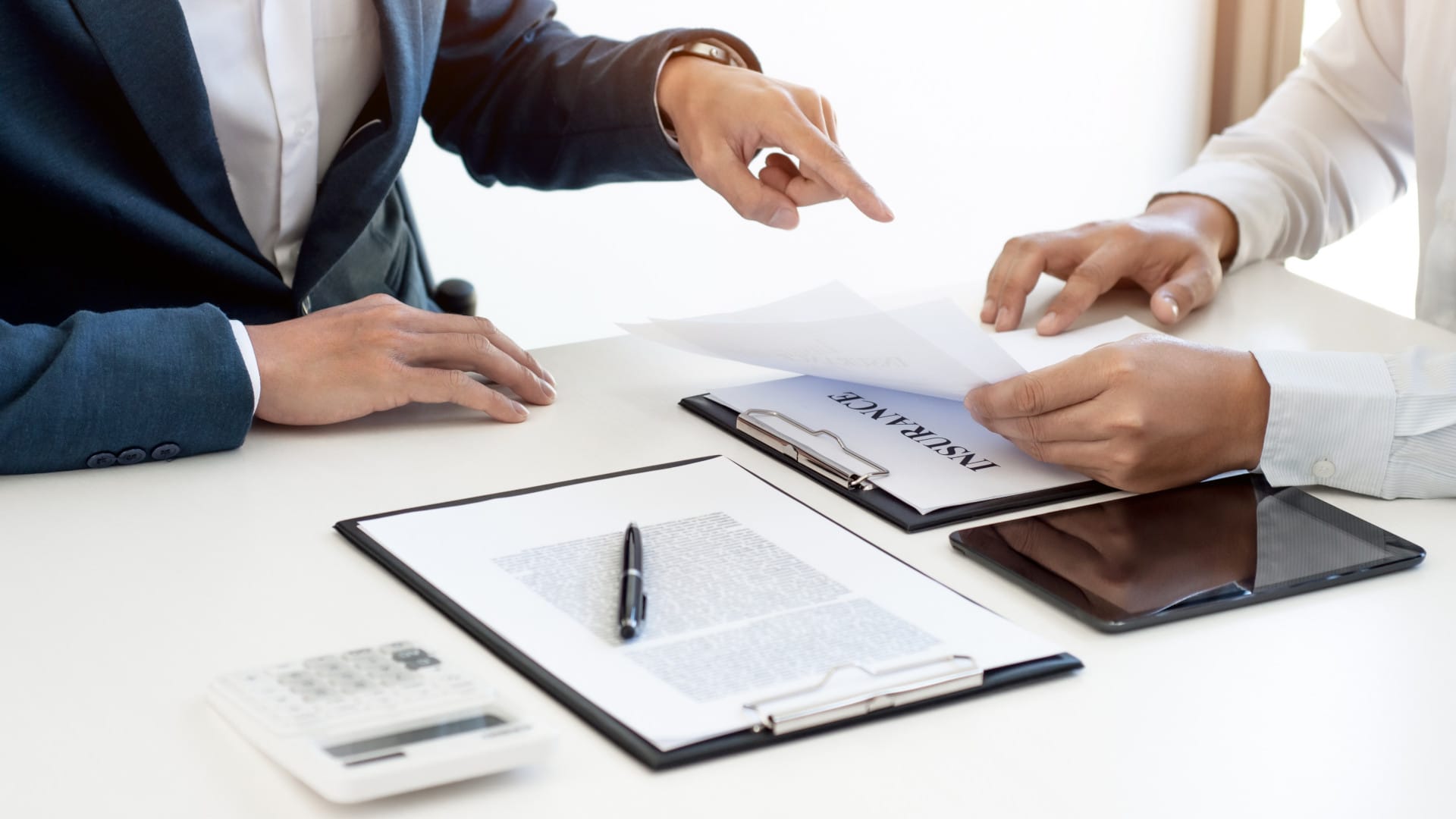 Insurance agent discussing with customer about insurance policy